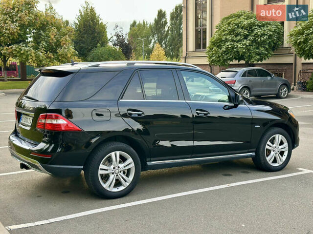 Черный Мерседес М-Класс, объемом двигателя 2.99 л и пробегом 226 тыс. км за 20499 $, фото 8 на Automoto.ua