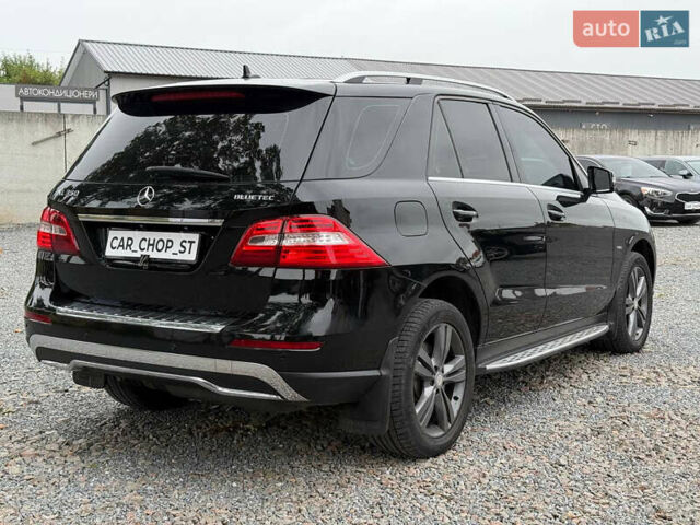 Мерседес М-Класс 2012 в Стрые на Automoto.ua Черный Мерседес М-Класс, объемом двигателя 2.99 л и пробегом 170 тыс. км за 18900 $, фото 5 на Automoto.ua