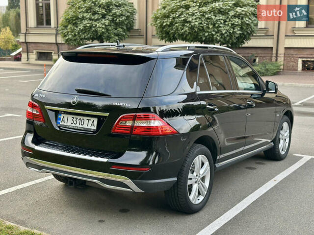 Черный Мерседес М-Класс, объемом двигателя 2.99 л и пробегом 226 тыс. км за 20499 $, фото 9 на Automoto.ua