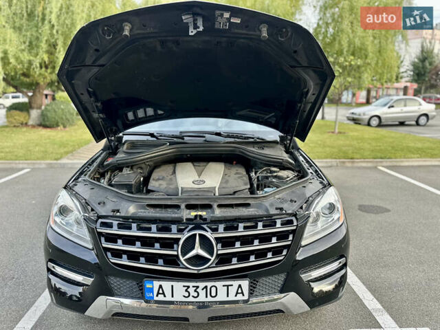 Черный Мерседес М-Класс, объемом двигателя 2.99 л и пробегом 226 тыс. км за 20499 $, фото 63 на Automoto.ua