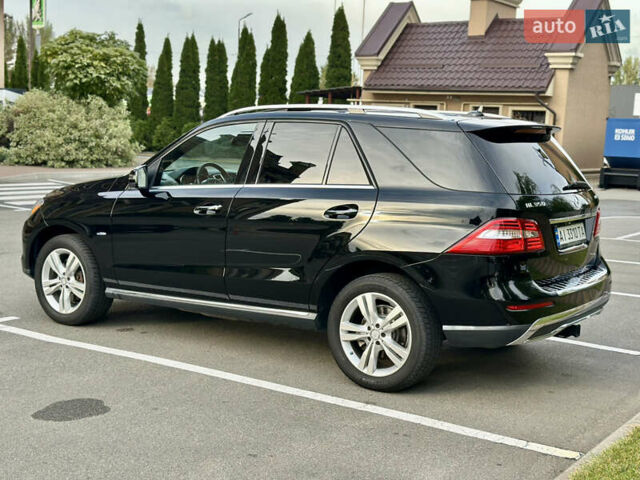 Черный Мерседес М-Класс, объемом двигателя 2.99 л и пробегом 226 тыс. км за 20499 $, фото 12 на Automoto.ua