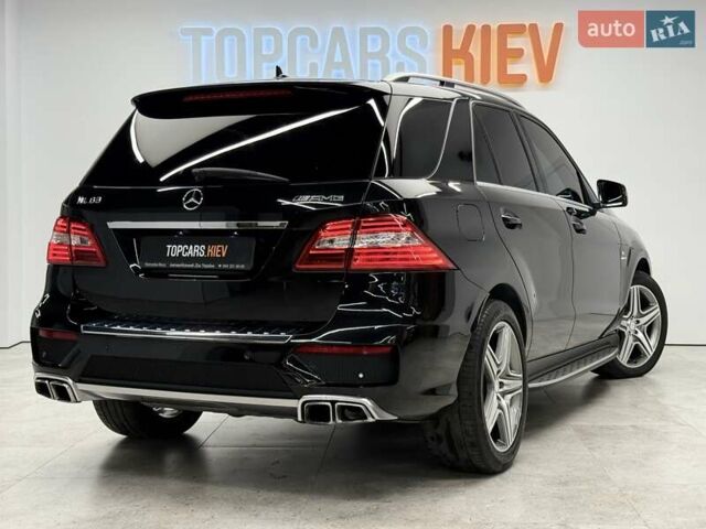 Черный Мерседес М-Класс, объемом двигателя 5.46 л и пробегом 119 тыс. км за 32990 $, фото 6 на Automoto.ua
