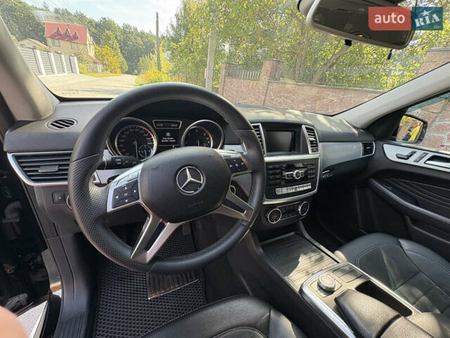 Мерседес М-Клас 2012 у Житомирі на Automoto.ua Чорний Мерседес М-Клас, об'ємом двигуна 2.14 л та пробігом 261 тис. км за 18900 $, фото 13 на Automoto.ua