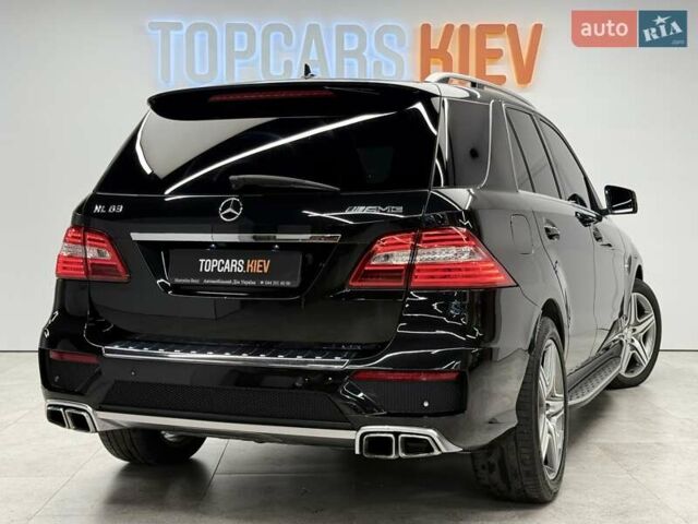 Черный Мерседес М-Класс, объемом двигателя 5.46 л и пробегом 119 тыс. км за 32990 $, фото 7 на Automoto.ua