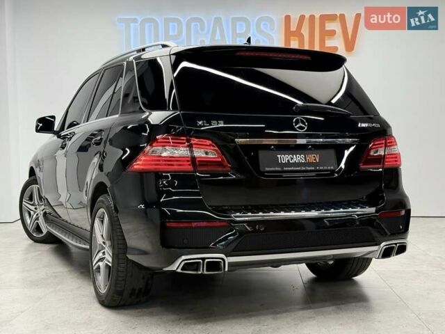 Черный Мерседес М-Класс, объемом двигателя 5.46 л и пробегом 119 тыс. км за 32990 $, фото 9 на Automoto.ua