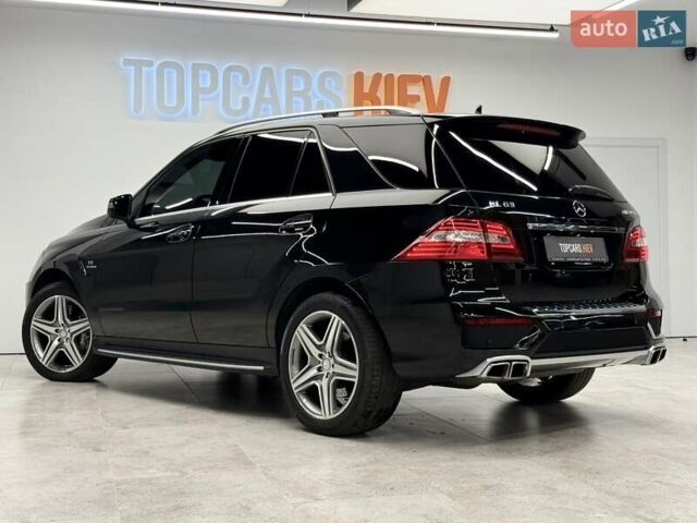 Черный Мерседес М-Класс, объемом двигателя 5.46 л и пробегом 119 тыс. км за 32990 $, фото 12 на Automoto.ua