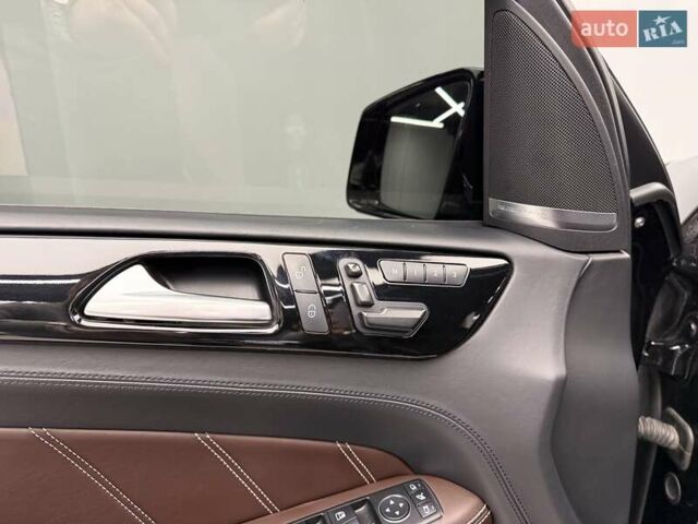 Черный Мерседес М-Класс, объемом двигателя 5.46 л и пробегом 119 тыс. км за 32990 $, фото 19 на Automoto.ua