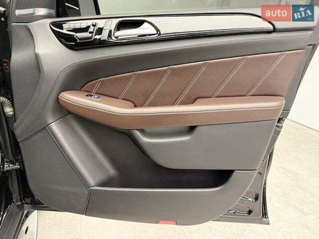 Черный Мерседес М-Класс, объемом двигателя 5.46 л и пробегом 119 тыс. км за 32990 $, фото 36 на Automoto.ua