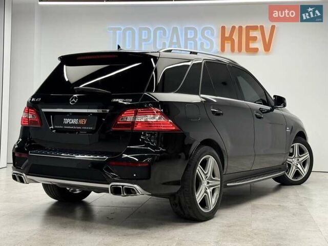 Черный Мерседес М-Класс, объемом двигателя 5.46 л и пробегом 119 тыс. км за 32990 $, фото 5 на Automoto.ua