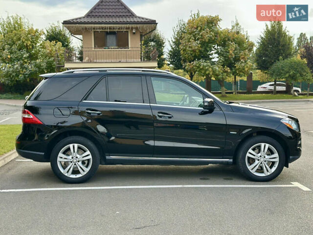 Черный Мерседес М-Класс, объемом двигателя 2.99 л и пробегом 226 тыс. км за 20499 $, фото 7 на Automoto.ua