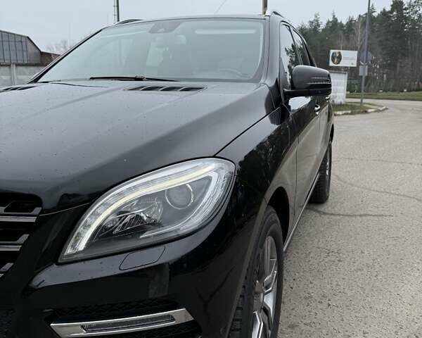 Черный Мерседес М-Класс, объемом двигателя 2.14 л и пробегом 220 тыс. км за 21000 $, фото 13 на Automoto.ua