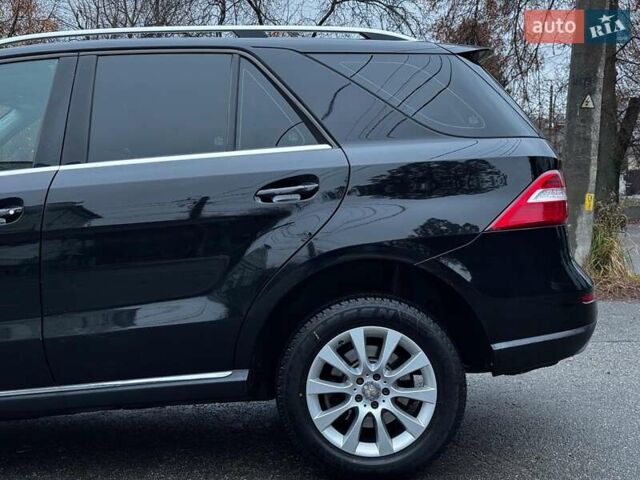 Черный Мерседес М-Класс, объемом двигателя 2.2 л и пробегом 205 тыс. км за 19490 $, фото 17 на Automoto.ua