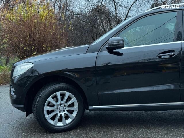 Черный Мерседес М-Класс, объемом двигателя 2.2 л и пробегом 205 тыс. км за 19490 $, фото 19 на Automoto.ua