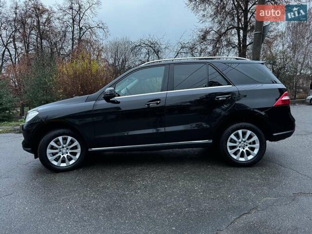 Черный Мерседес М-Класс, объемом двигателя 2.2 л и пробегом 205 тыс. км за 19490 $, фото 18 на Automoto.ua