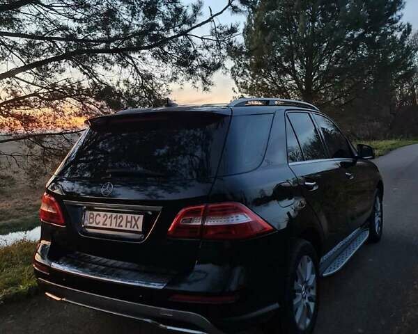 Черный Мерседес М-Класс, объемом двигателя 3 л и пробегом 215 тыс. км за 23000 $, фото 4 на Automoto.ua