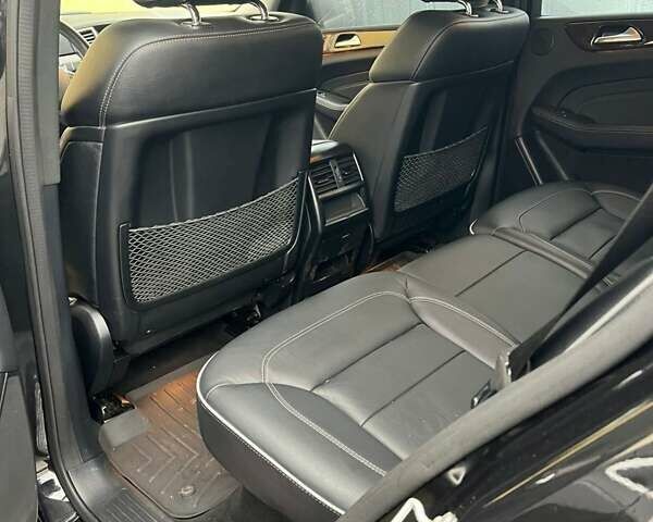 Черный Мерседес М-Класс, объемом двигателя 3 л и пробегом 156 тыс. км за 28000 $, фото 6 на Automoto.ua