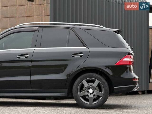 Черный Мерседес М-Класс, объемом двигателя 3.5 л и пробегом 331 тыс. км за 16950 $, фото 20 на Automoto.ua