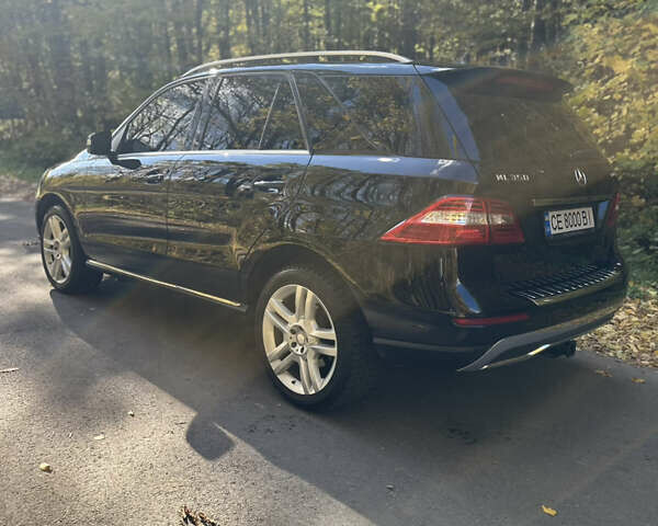 Мерседес М-Класс 2013 в Черновцах на Automoto.ua Черный Мерседес М-Класс, объемом двигателя 2.99 л и пробегом 297 тыс. км за 18500 $, фото 13 на Automoto.ua