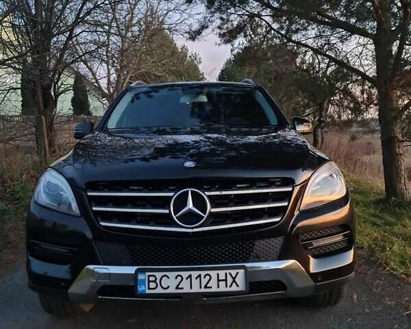 Черный Мерседес М-Класс, объемом двигателя 3 л и пробегом 215 тыс. км за 23000 $, фото 2 на Automoto.ua