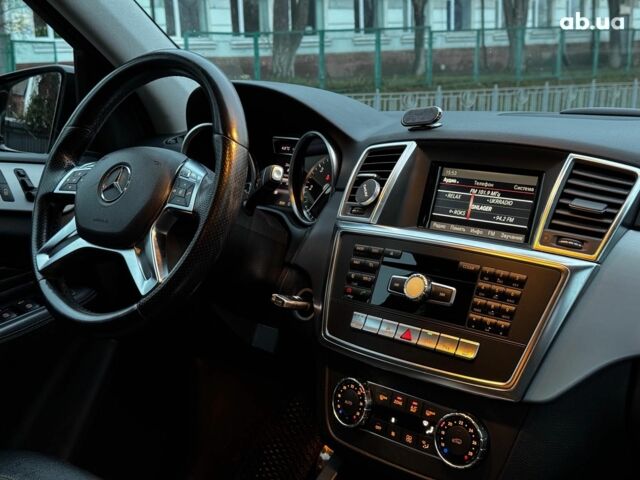 Черный Мерседес М-Класс, объемом двигателя 2.2 л и пробегом 205 тыс. км за 19490 $, фото 43 на Automoto.ua