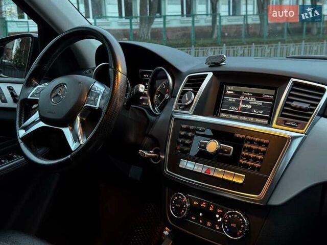 Черный Мерседес М-Класс, объемом двигателя 2.2 л и пробегом 205 тыс. км за 19490 $, фото 42 на Automoto.ua