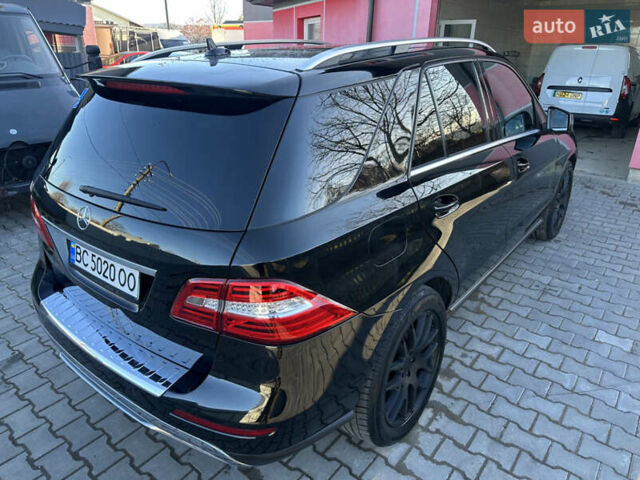 Черный Мерседес М-Класс, объемом двигателя 3 л и пробегом 377 тыс. км за 23500 $, фото 17 на Automoto.ua