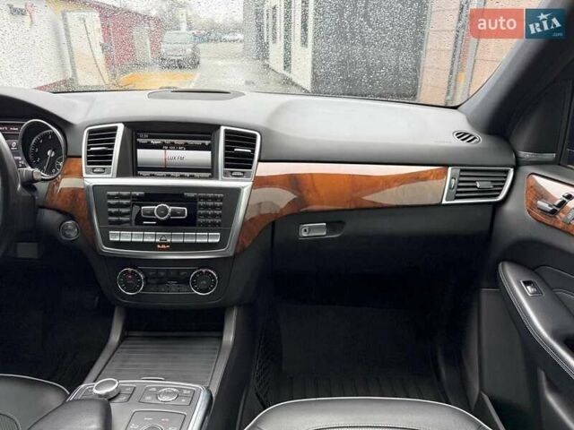 Черный Мерседес М-Класс, объемом двигателя 3.5 л и пробегом 331 тыс. км за 16950 $, фото 27 на Automoto.ua