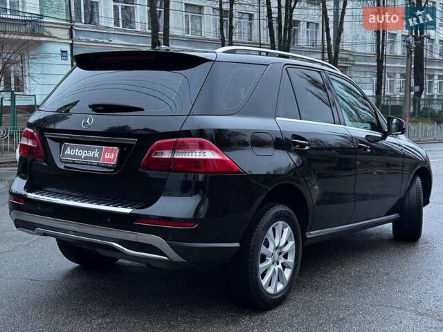 Черный Мерседес М-Класс, объемом двигателя 2.2 л и пробегом 205 тыс. км за 19490 $, фото 11 на Automoto.ua