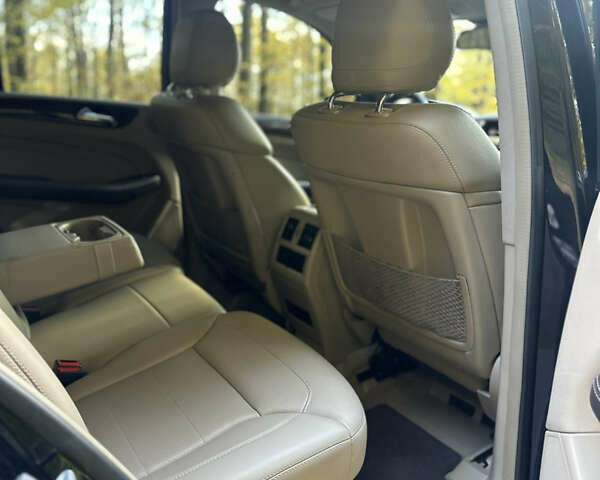 Мерседес М-Класс 2013 в Черновцах на Automoto.ua Черный Мерседес М-Класс, объемом двигателя 2.99 л и пробегом 297 тыс. км за 18500 $, фото 26 на Automoto.ua