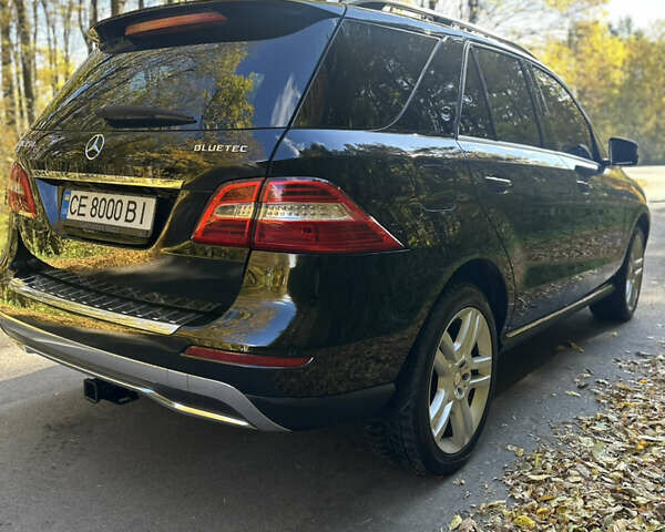 Мерседес М-Класс 2013 в Черновцах на Automoto.ua Черный Мерседес М-Класс, объемом двигателя 2.99 л и пробегом 297 тыс. км за 18500 $, фото 37 на Automoto.ua