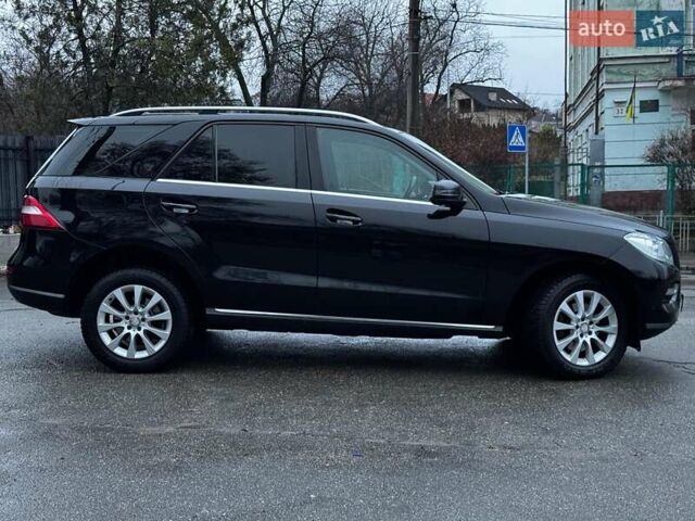 Черный Мерседес М-Класс, объемом двигателя 2.2 л и пробегом 205 тыс. км за 19490 $, фото 9 на Automoto.ua