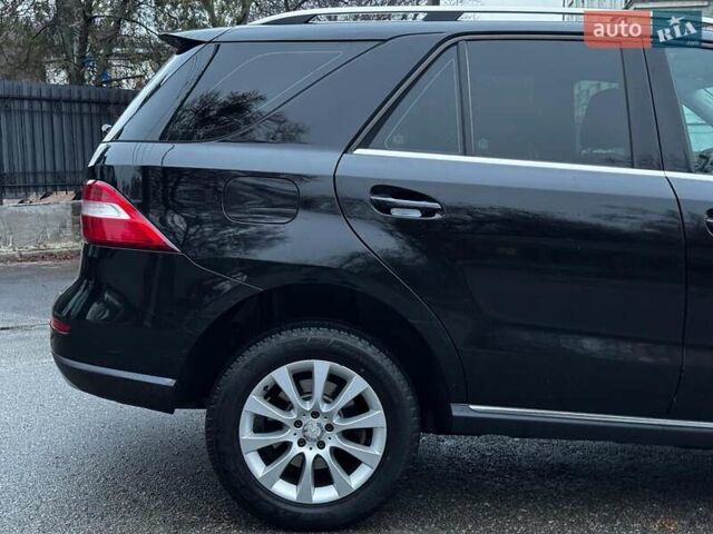 Черный Мерседес М-Класс, объемом двигателя 2.2 л и пробегом 205 тыс. км за 19490 $, фото 10 на Automoto.ua