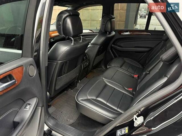 Черный Мерседес М-Класс, объемом двигателя 3.5 л и пробегом 331 тыс. км за 16950 $, фото 18 на Automoto.ua