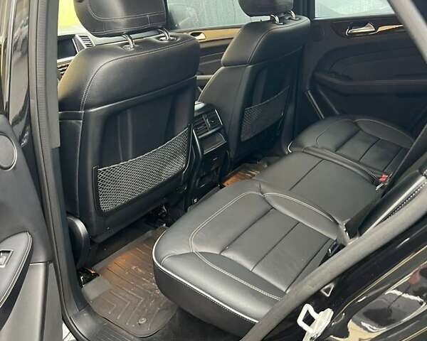 Черный Мерседес М-Класс, объемом двигателя 3 л и пробегом 156 тыс. км за 28000 $, фото 10 на Automoto.ua