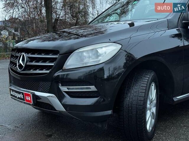 Черный Мерседес М-Класс, объемом двигателя 2.2 л и пробегом 205 тыс. км за 19490 $, фото 2 на Automoto.ua