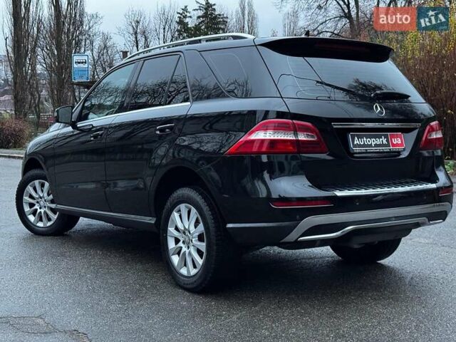 Черный Мерседес М-Класс, объемом двигателя 2.2 л и пробегом 205 тыс. км за 19490 $, фото 16 на Automoto.ua