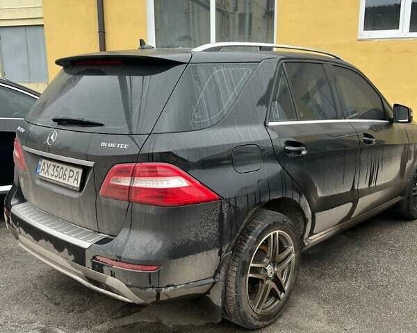 Черный Мерседес М-Класс, объемом двигателя 3 л и пробегом 156 тыс. км за 28000 $, фото 17 на Automoto.ua