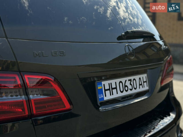 Черный Мерседес М-Класс, объемом двигателя 5.5 л и пробегом 153 тыс. км за 36000 $, фото 26 на Automoto.ua