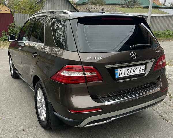 Коричневый Мерседес М-Класс, объемом двигателя 2.14 л и пробегом 187 тыс. км за 21000 $, фото 6 на Automoto.ua