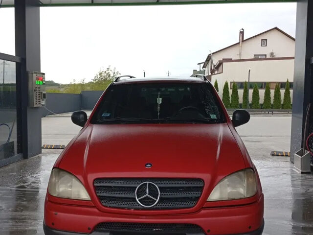 Красный Мерседес М-Класс, объемом двигателя 3.2 л и пробегом 264 тыс. км за 4850 $, фото 2 на Automoto.ua