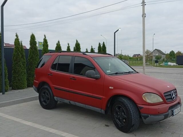 Красный Мерседес М-Класс, объемом двигателя 3.2 л и пробегом 264 тыс. км за 4850 $, фото 5 на Automoto.ua