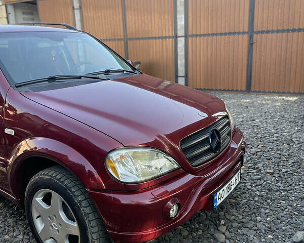 Красный Мерседес М-Класс, объемом двигателя 3.2 л и пробегом 265 тыс. км за 8000 $, фото 12 на Automoto.ua