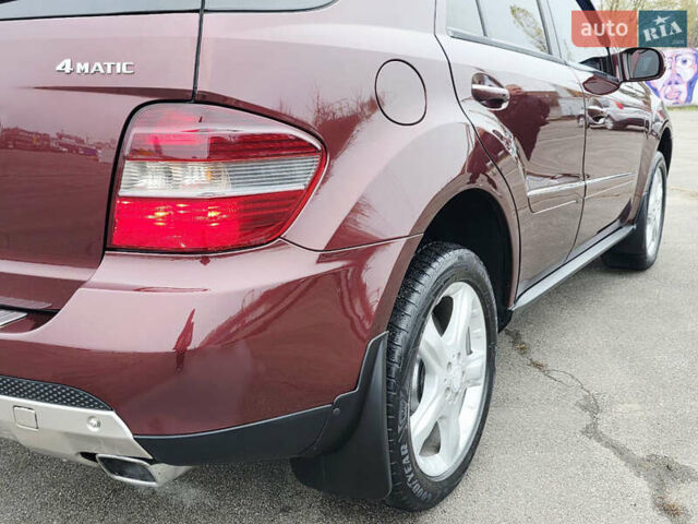 Красный Мерседес М-Класс, объемом двигателя 3.5 л и пробегом 266 тыс. км за 11499 $, фото 26 на Automoto.ua