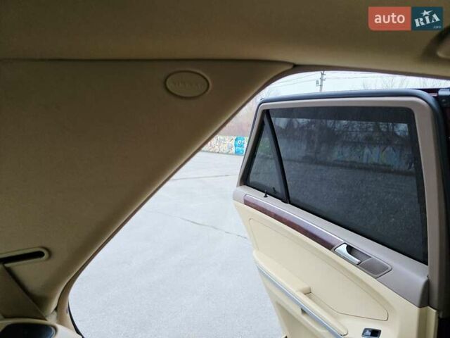 Красный Мерседес М-Класс, объемом двигателя 3.5 л и пробегом 266 тыс. км за 9333 $, фото 90 на Automoto.ua