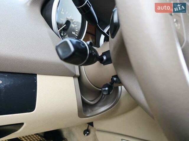 Красный Мерседес М-Класс, объемом двигателя 3.5 л и пробегом 266 тыс. км за 9333 $, фото 115 на Automoto.ua