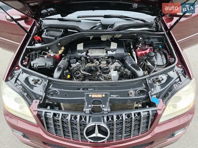 Красный Мерседес М-Класс, объемом двигателя 3.5 л и пробегом 266 тыс. км за 9333 $, фото 54 на Automoto.ua