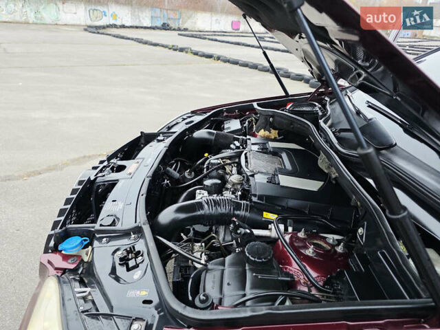 Красный Мерседес М-Класс, объемом двигателя 3.5 л и пробегом 266 тыс. км за 11499 $, фото 58 на Automoto.ua