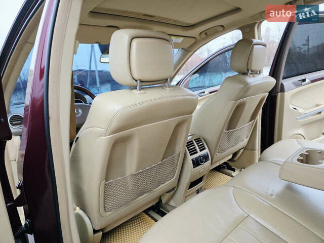 Красный Мерседес М-Класс, объемом двигателя 3.5 л и пробегом 266 тыс. км за 11499 $, фото 76 на Automoto.ua