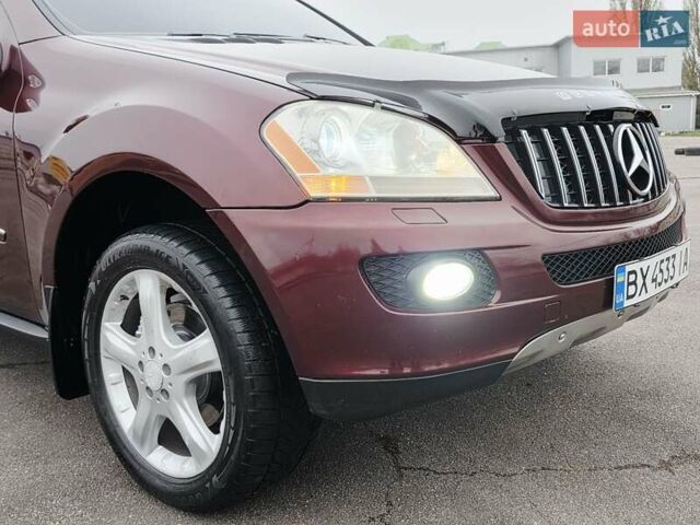 Красный Мерседес М-Класс, объемом двигателя 3.5 л и пробегом 266 тыс. км за 9333 $, фото 46 на Automoto.ua