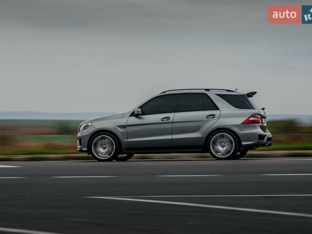 Сірий Мерседес М-Клас, об'ємом двигуна 5.46 л та пробігом 203 тис. км за 55000 $, фото 33 на Automoto.ua